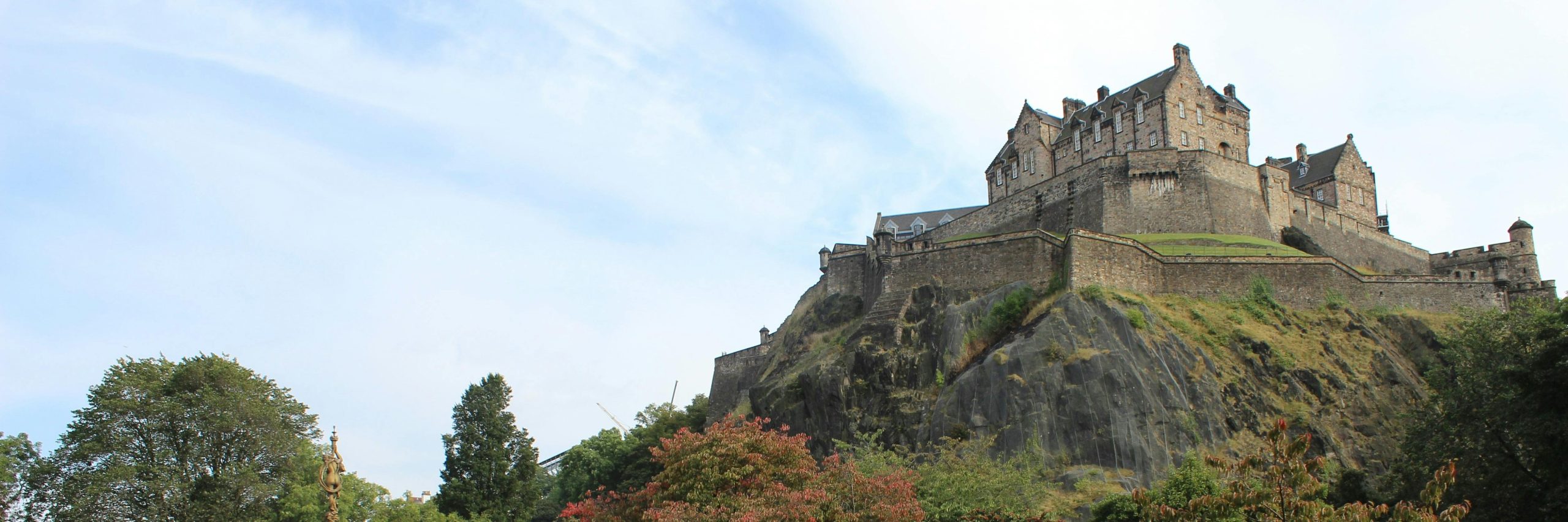 Edinburgh Castle perched majestically on volcanic rock overlooking the city